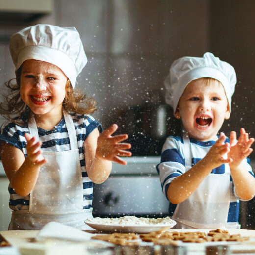 kids playing in a kitchen.