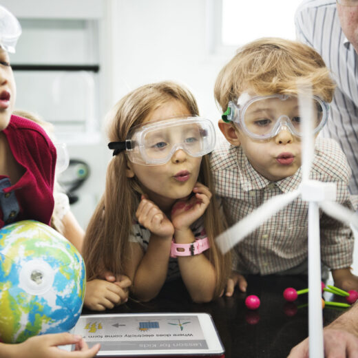 kids performing a science experiment.